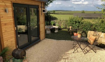 Why you should invest in a summerhouse this summer